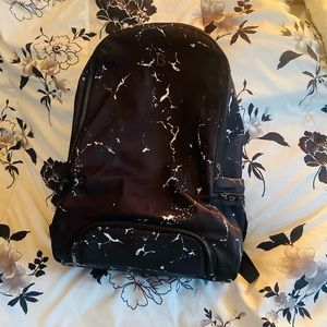 Very good condition, only thing it has is a little makeup stain inside